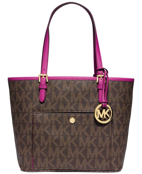 michael kors bag with front pocket|More.